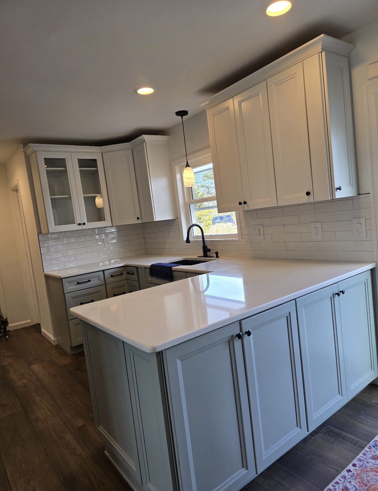 Mission Accomplished Construction measuring a kitchen during a free in-home consultation in Burlington County NJ